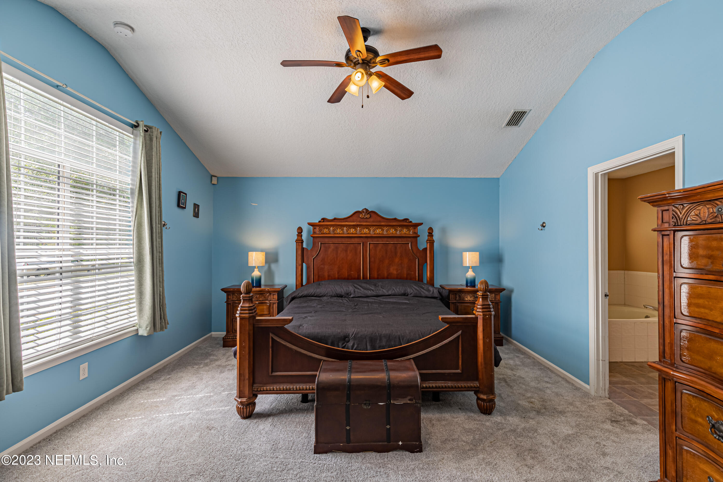 1094 Cactus Cut Road Middleburg, FL 32068 - Photo 15 of 32 a living room with furniture and a chandelier