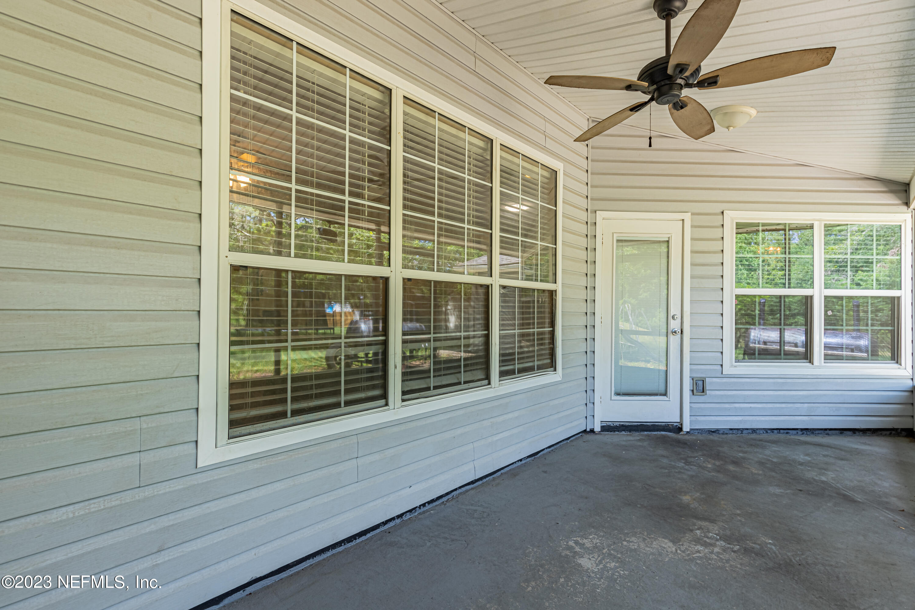 1094 Cactus Cut Road Middleburg, FL 32068 - Photo 27 of 32 a view of a house with a large window