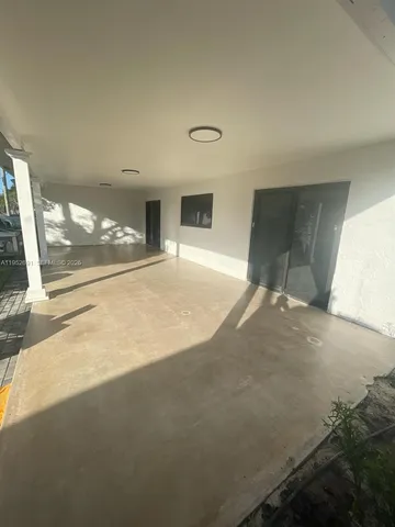 a view of a livingroom with a staircase