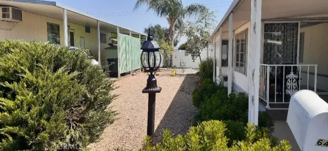 a view of a kitchen with stove and cabinets