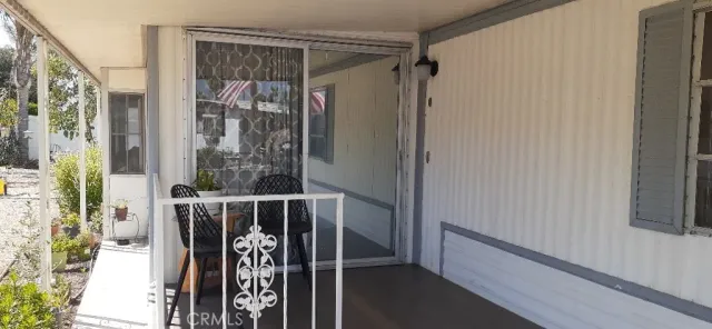 a kitchen with granite countertop a stove sink and cabinets