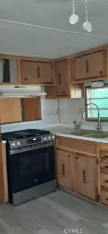 a room with window and cabinet