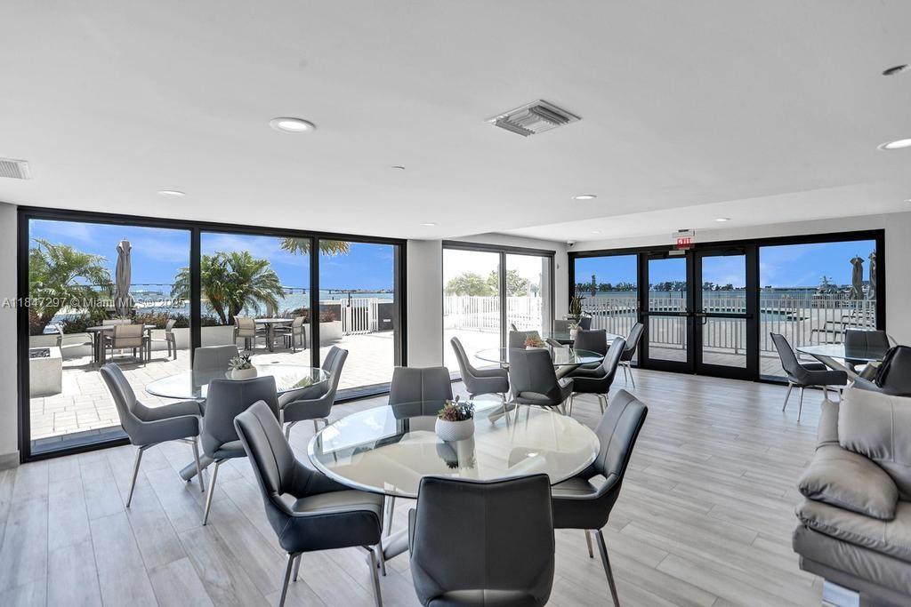 Brickell Miami, FL 33129 - Photo 38 of 42 a dining room with furniture window and wooden floor