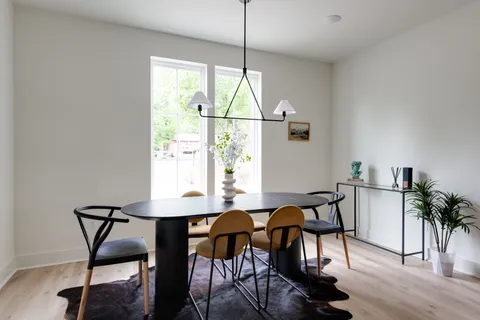 a dining room table in a room