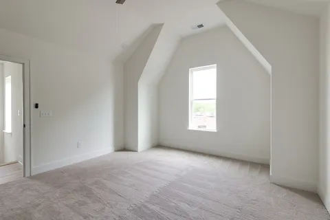 a bathroom with double sink and two mirror