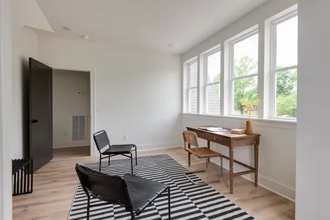 an empty room with windows