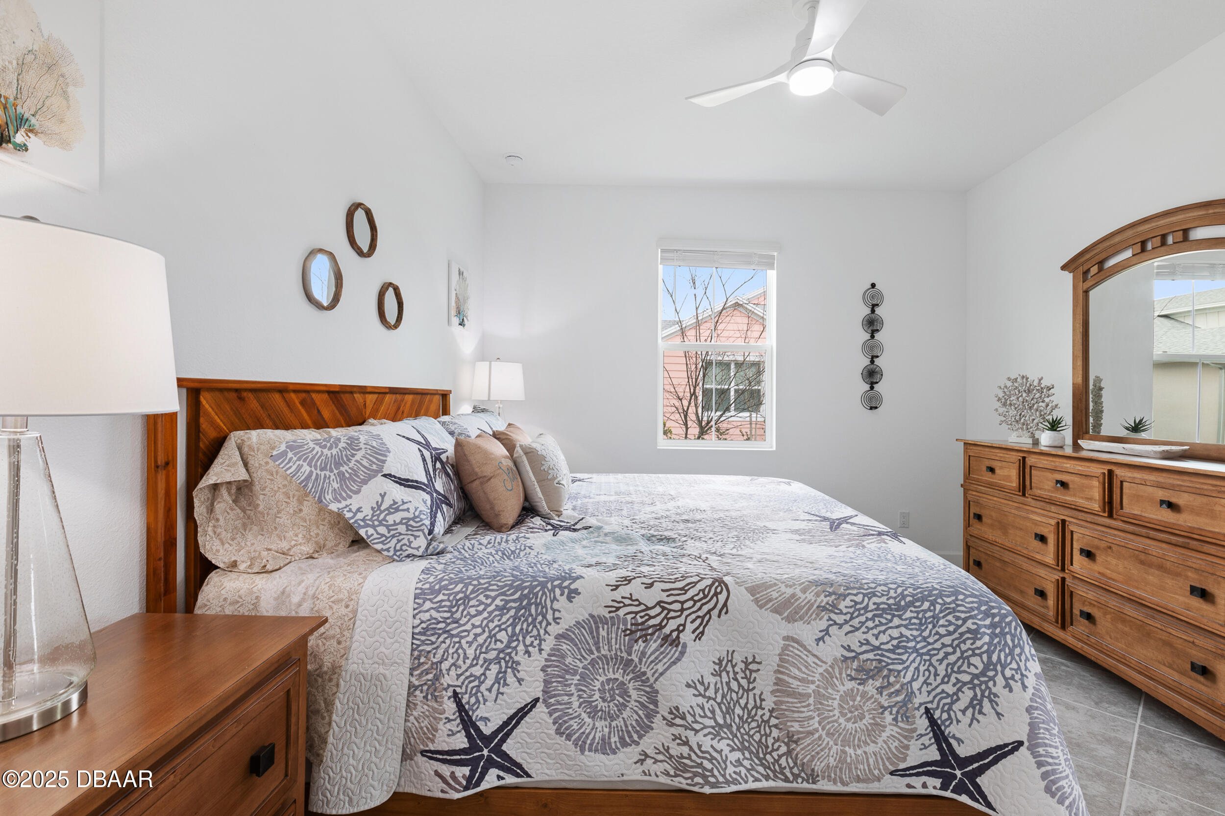 208 Ocean Hammock Loop Daytona Beach, FL 32124 - Photo 18 of 91 a bedroom with a bed and a window