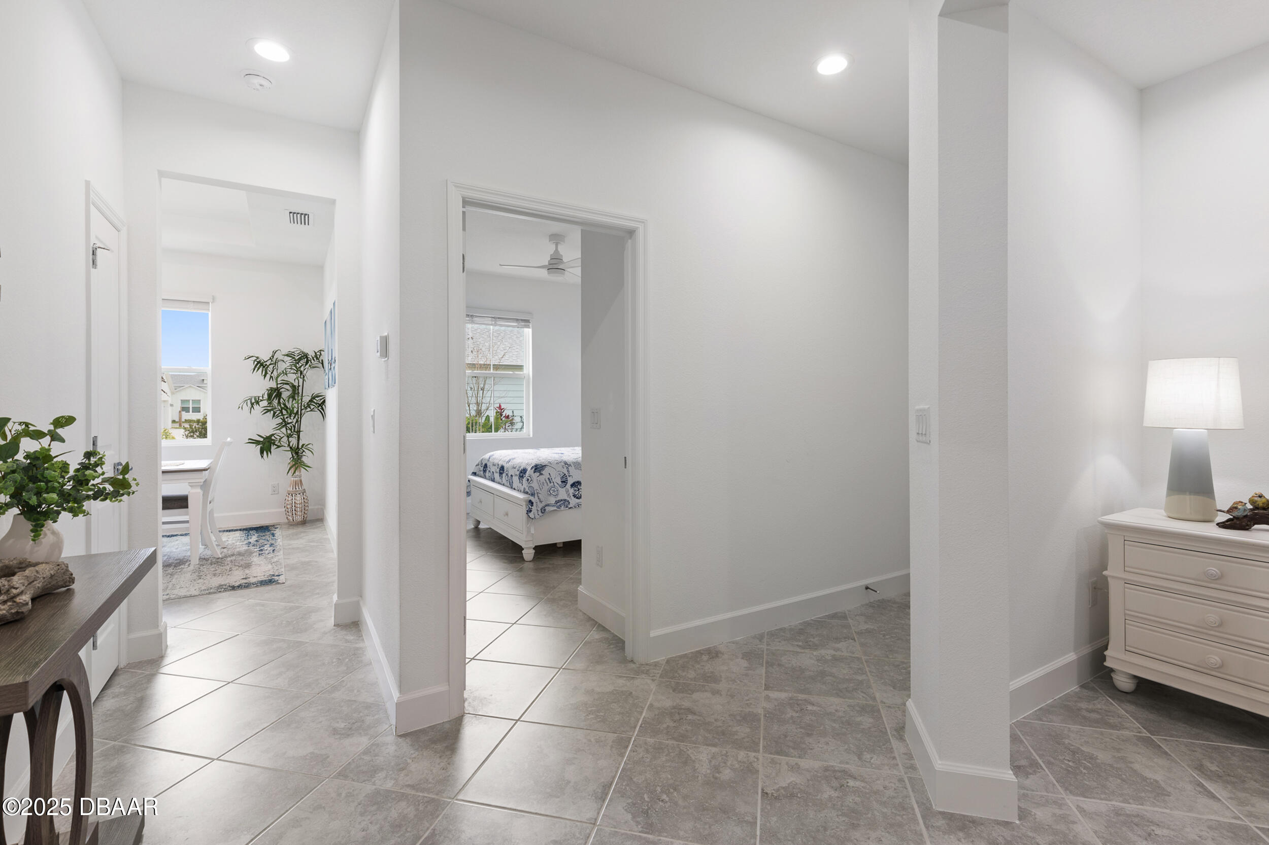 208 Ocean Hammock Loop Daytona Beach, FL 32124 - Photo 24 of 91 a bathroom with a sink and a mirror