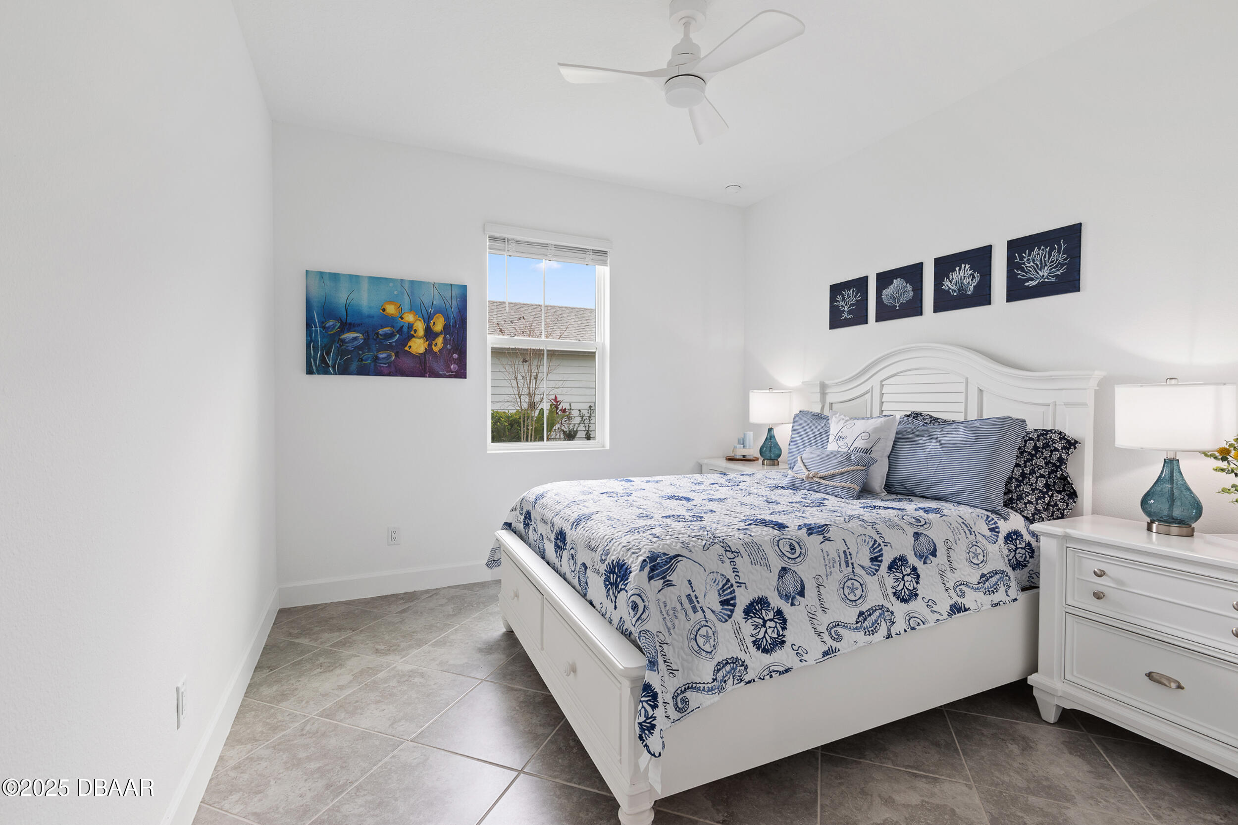 208 Ocean Hammock Loop Daytona Beach, FL 32124 - Photo 27 of 91 a bedroom with a bed and a painting on the wall