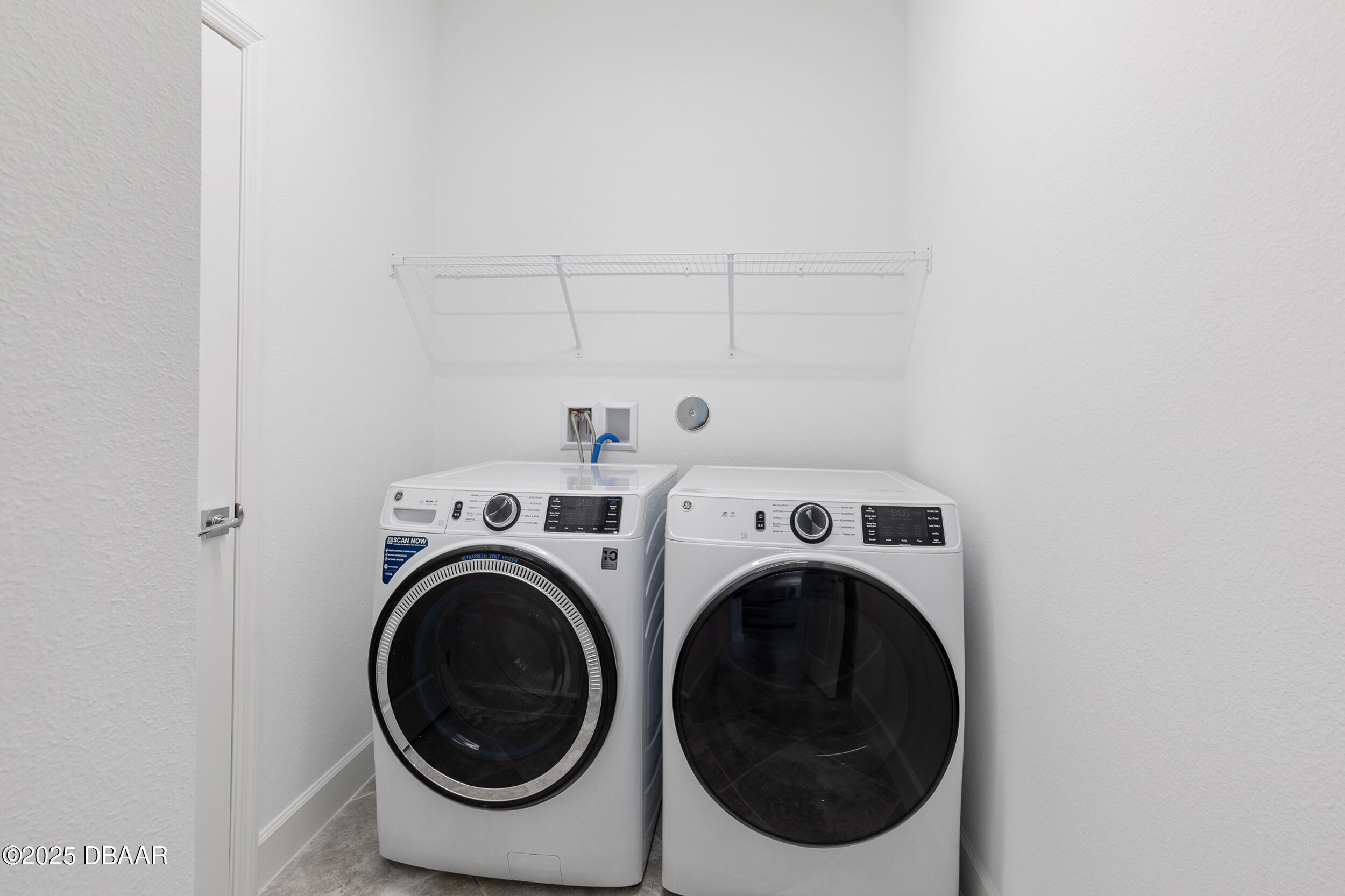 208 Ocean Hammock Loop Daytona Beach, FL 32124 - Photo 30 of 91 a utility room with dryer and washer
