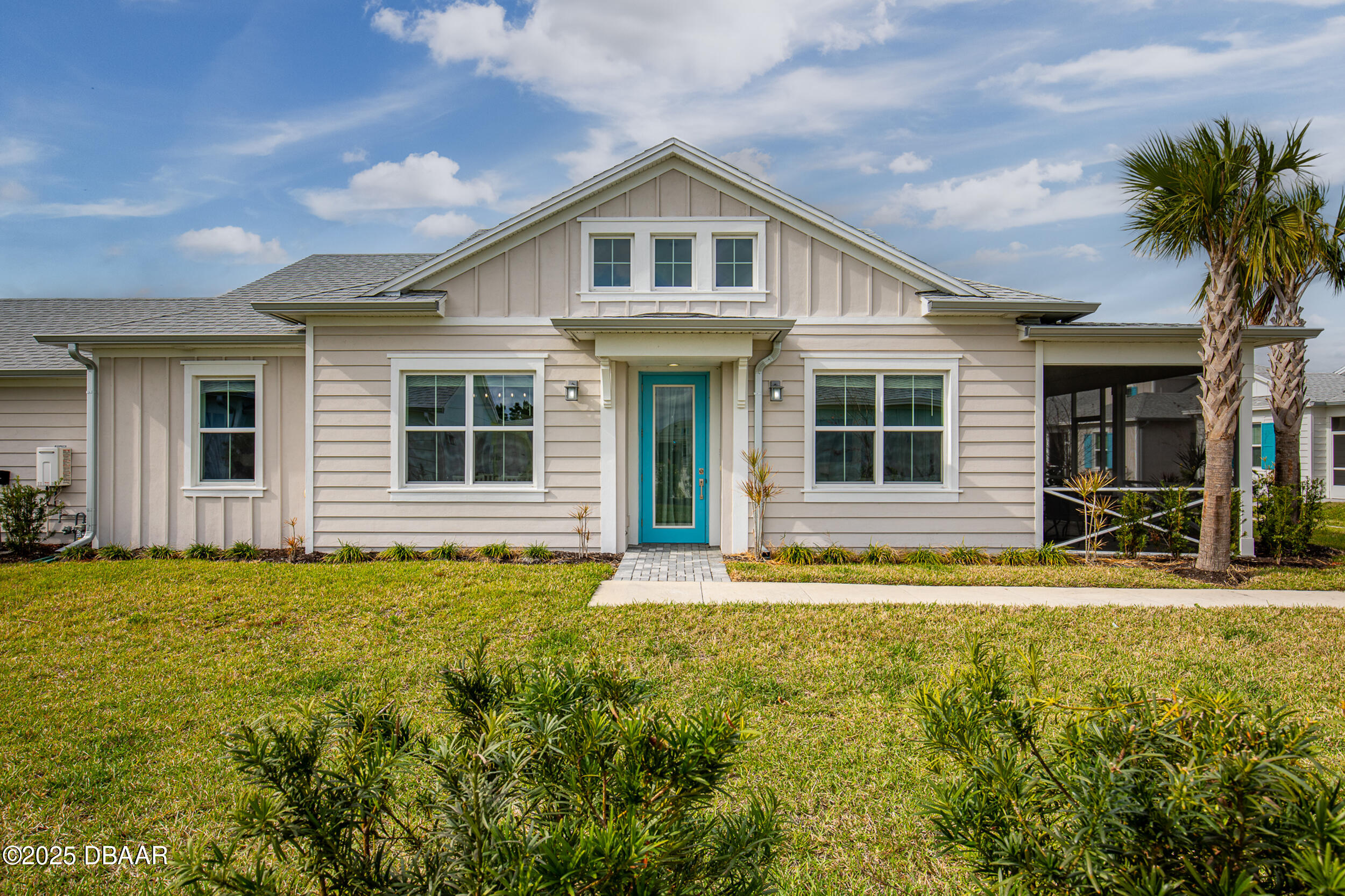 208 Ocean Hammock Loop Daytona Beach, FL 32124 - Photo 5 of 91 a front view of a house with a yard