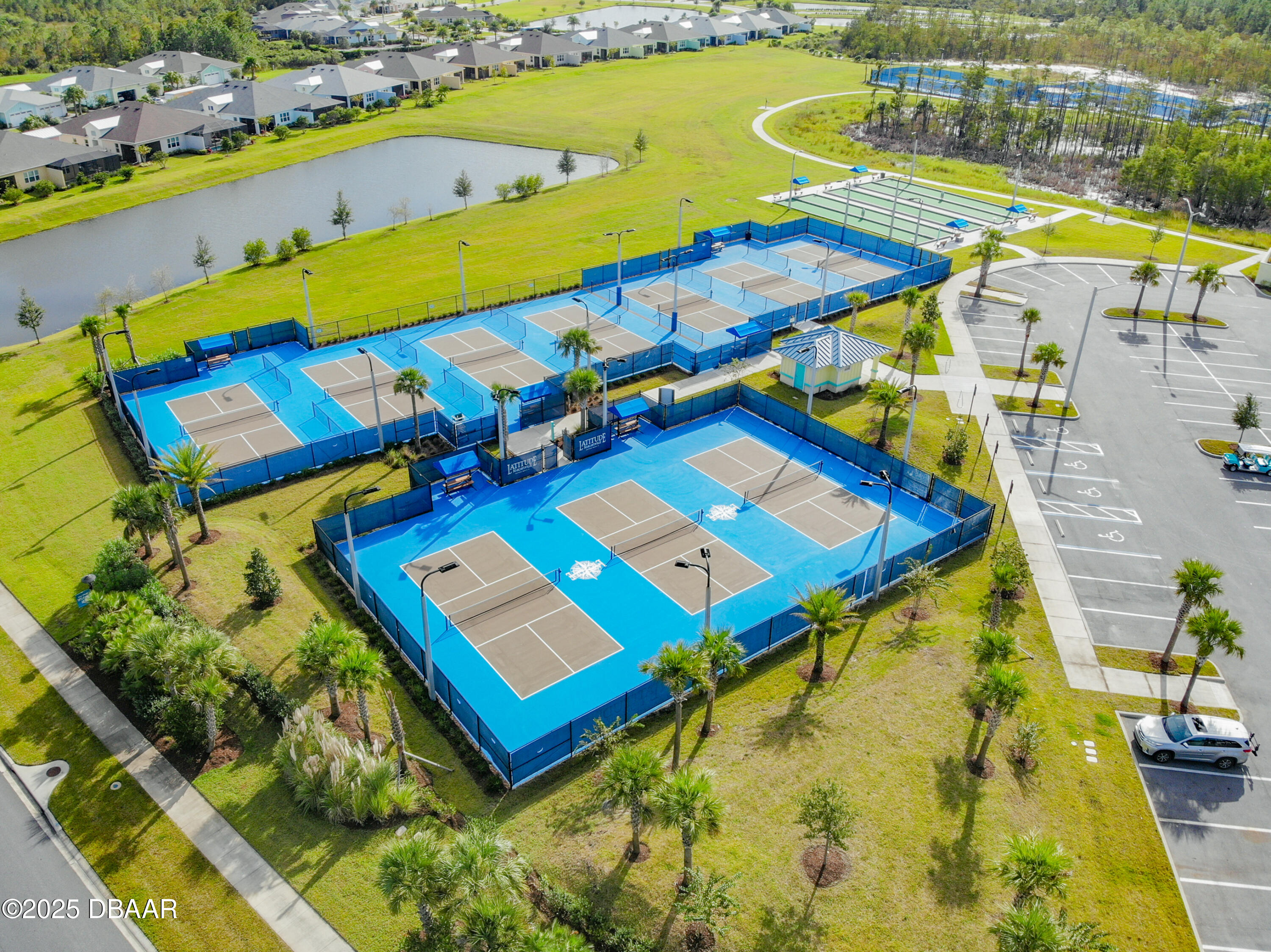 208 Ocean Hammock Loop Daytona Beach, FL 32124 - Photo 77 of 91 an aerial view of a pool patio swimming pool and outdoor seating
