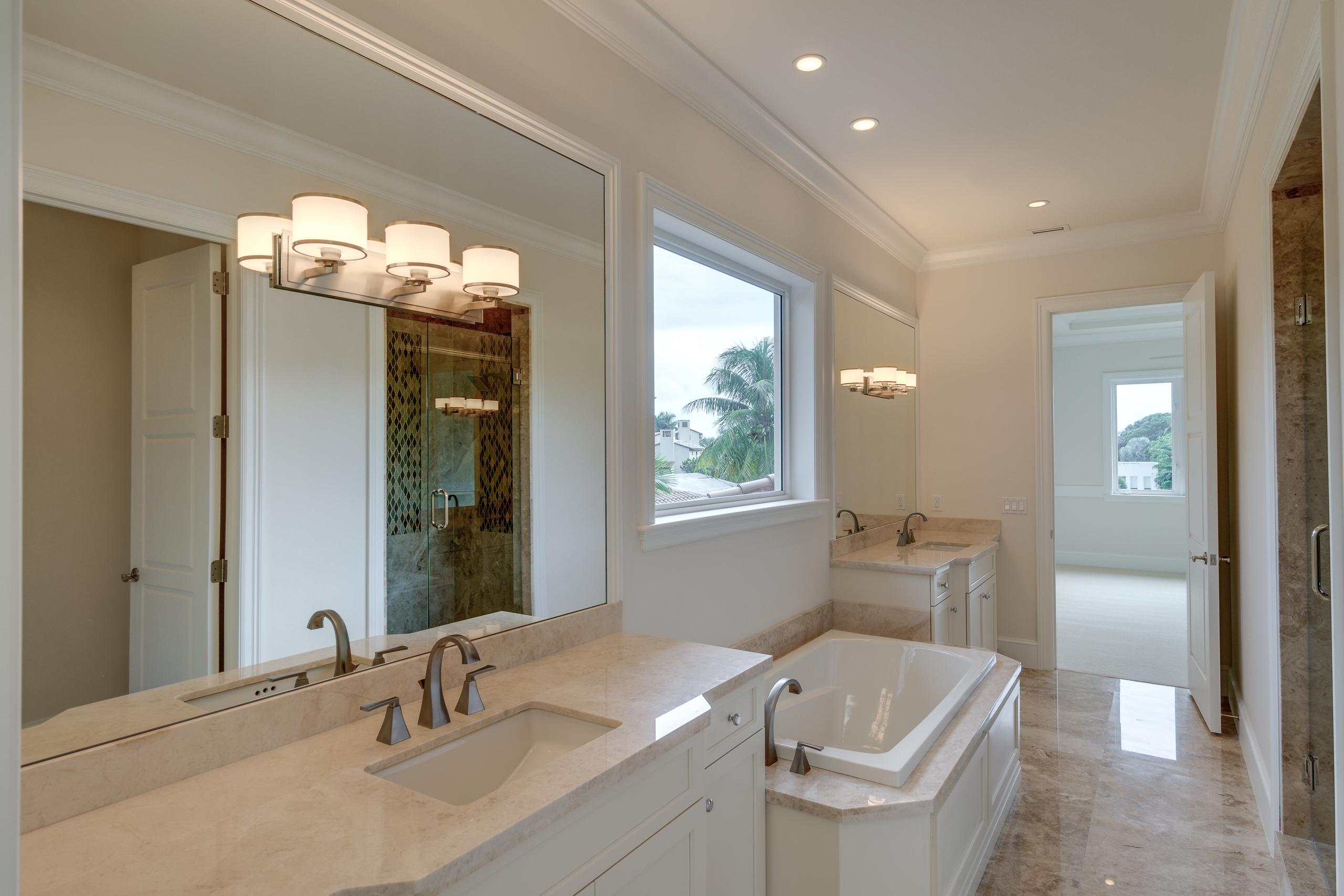 161 Commodore Drive Jupiter, FL 33477 - Photo 15 of 57 161 commodore guest bath 2-2