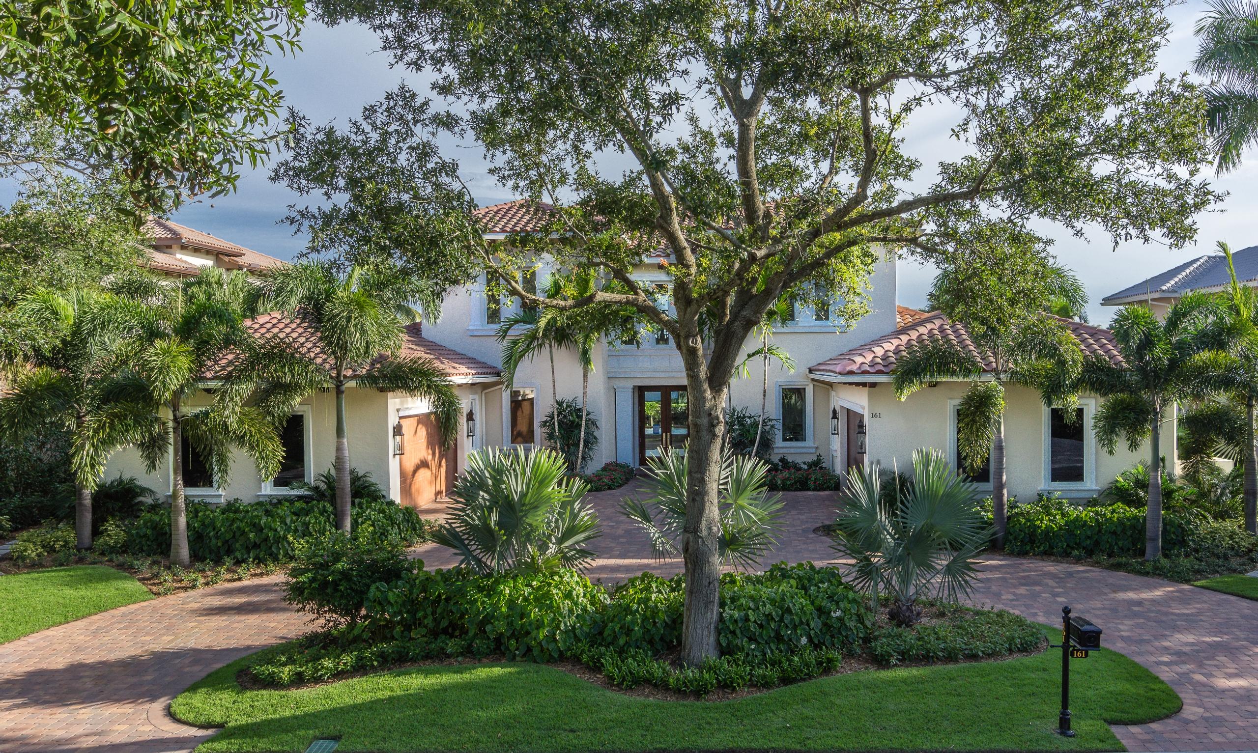 161 Commodore Drive Jupiter, FL 33477 - Photo 29 of 57 Front with circular drive
