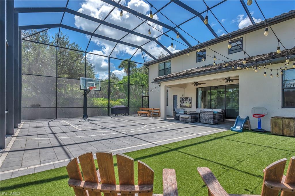 a view of a patio with table and chairs a barbeque with wooden fence