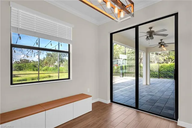 a view of front door and wooden floor