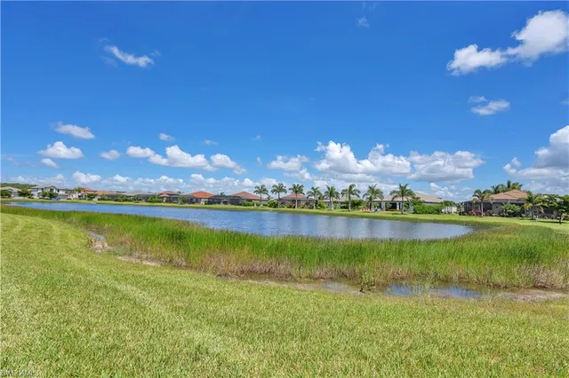 a view of a balcony with furniture