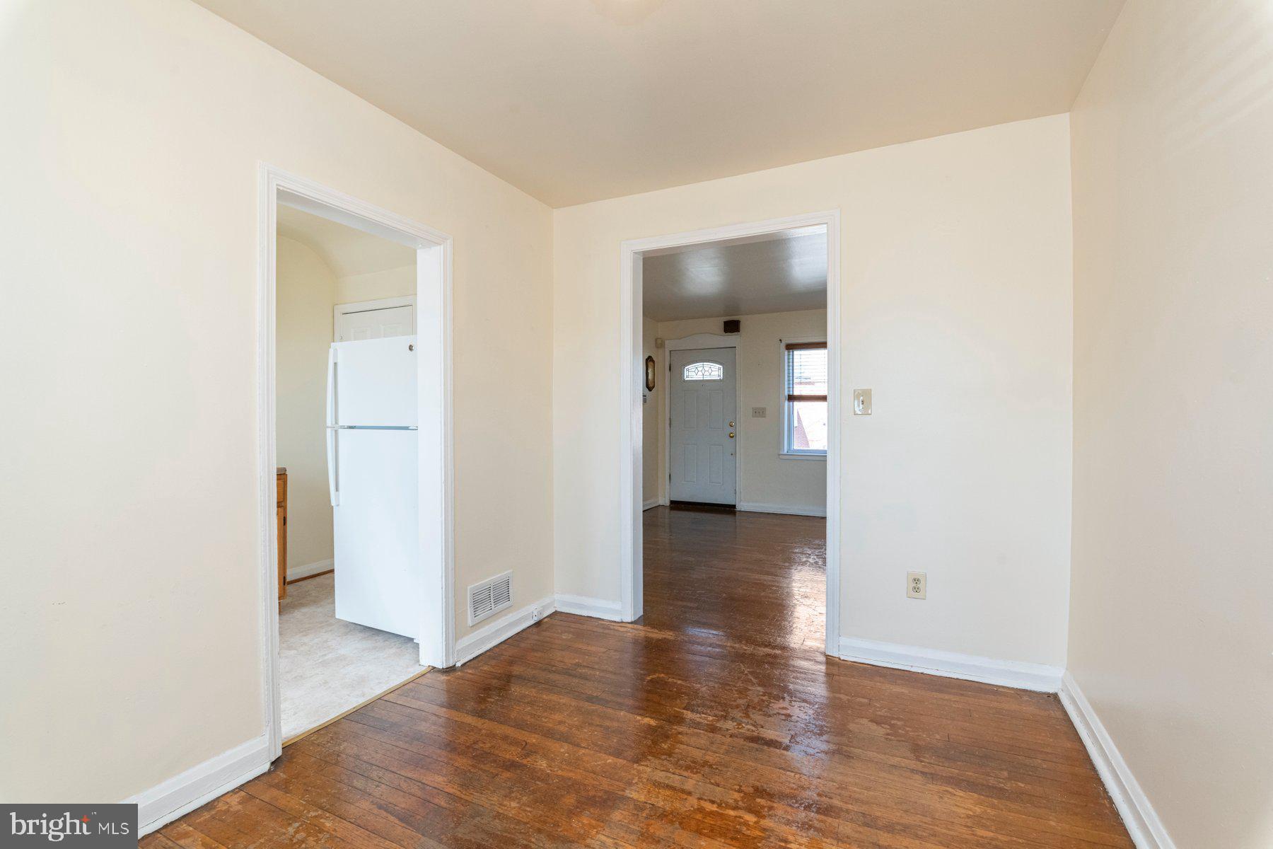 1039 Cameron Road Baltimore, MD 21212 - Photo 8 of 26 a view of empty room with wooden floor