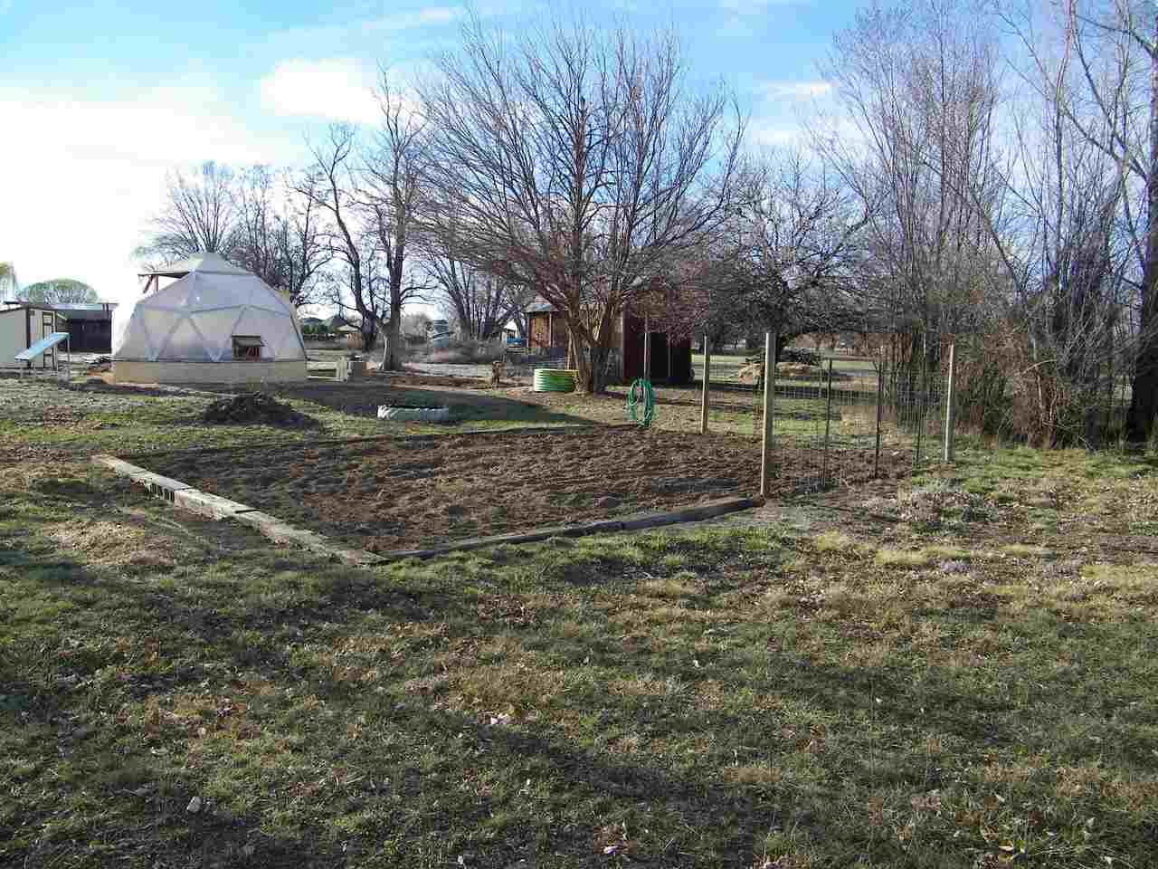 1866 J Road Fruita, CO 81521 - Photo 12 of 23 a view of a house with a yard