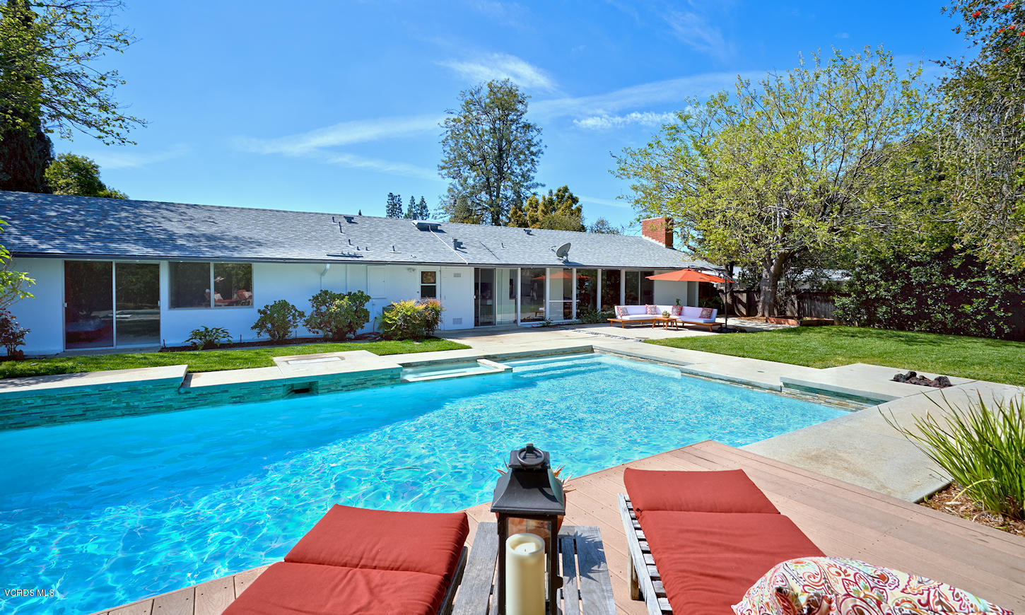 17031 Labrador Street Northridge, CA 91325 - Photo 16 of 20 a view of a house with swimming pool yard and patio