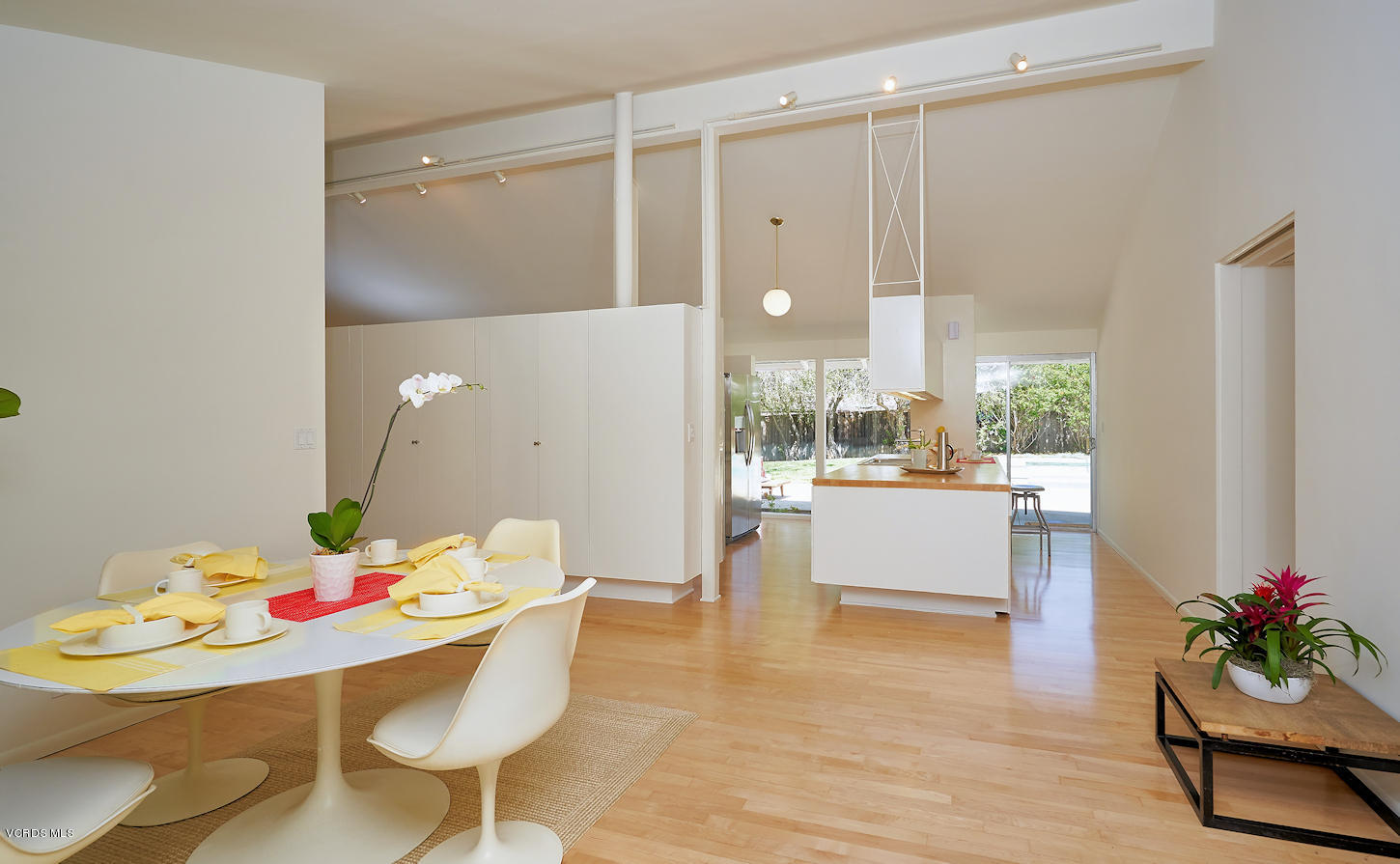 17031 Labrador Street Northridge, CA 91325 - Photo 9 of 20 a dining room with furniture and a floor to ceiling window