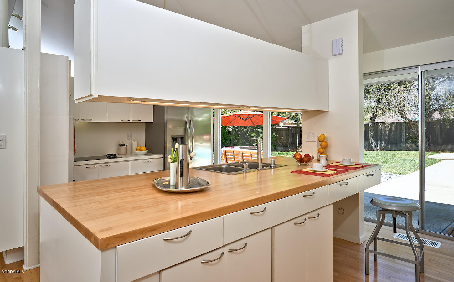 17031 Labrador Street Northridge, CA 91325 - Photo 10 of 20 a kitchen with a sink and cabinets