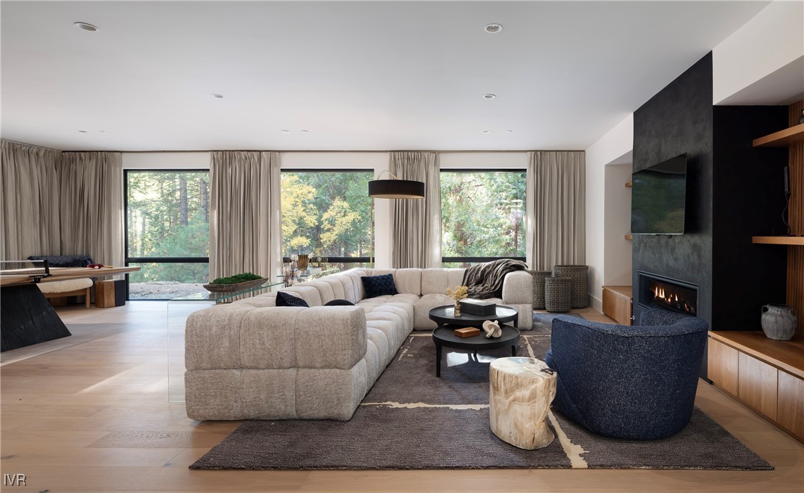 727 Kelly Drive Incline Village, NV 89451 - Photo 22 of 40 a living room with furniture and a flat screen tv