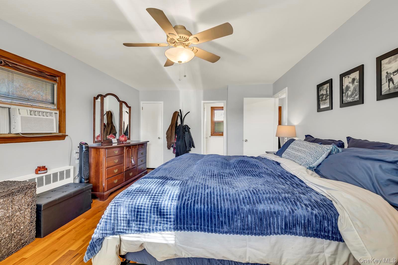 155 Fairview Road Farmingdale, NY 11735 - Photo 15 of 23 a bed room with a bed and dresser