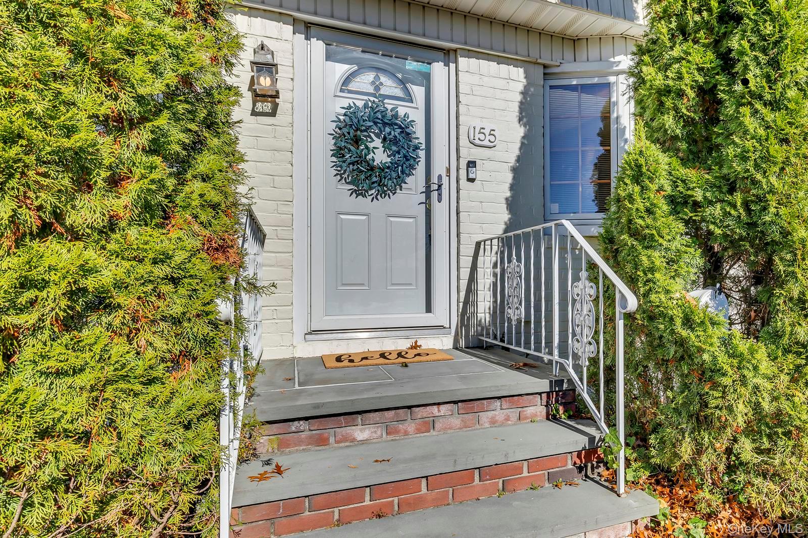 155 Fairview Road Farmingdale, NY 11735 - Photo 2 of 23 front view of a house with a yard