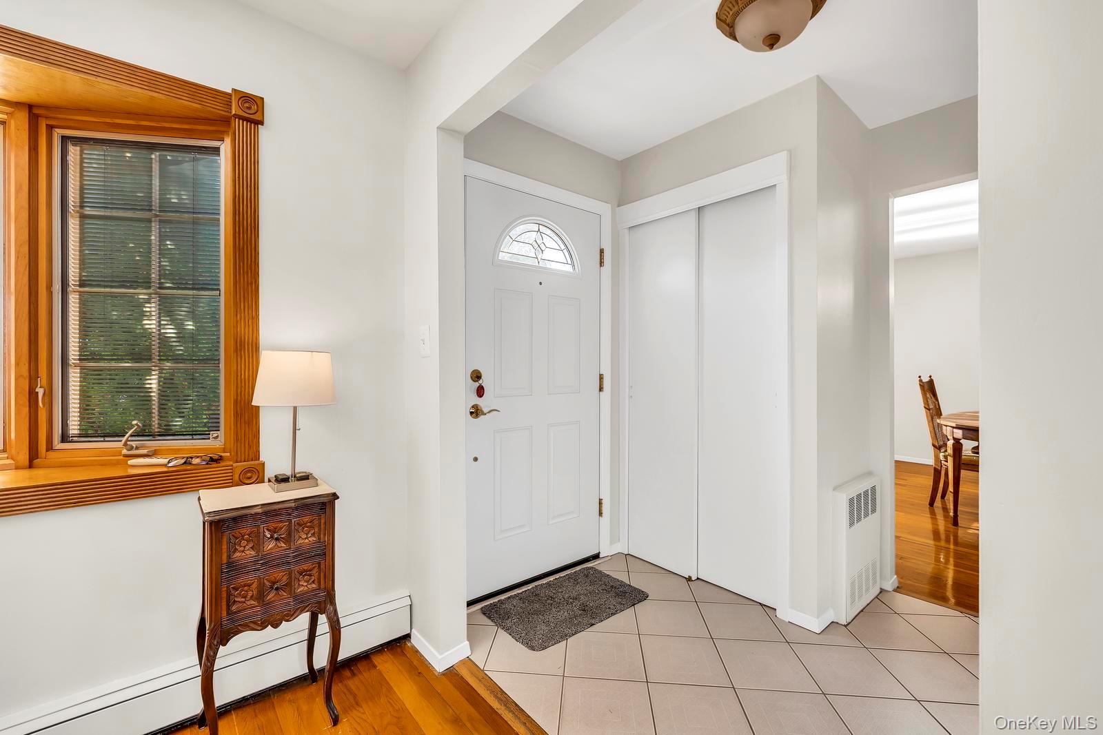 155 Fairview Road Farmingdale, NY 11735 - Photo 3 of 23 a view of an entryway with wooden floor