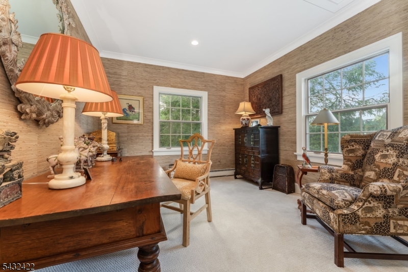 11 New Street Mendham, NJ 07945 - Photo 16 of 35 a living room with furniture and a fireplace
