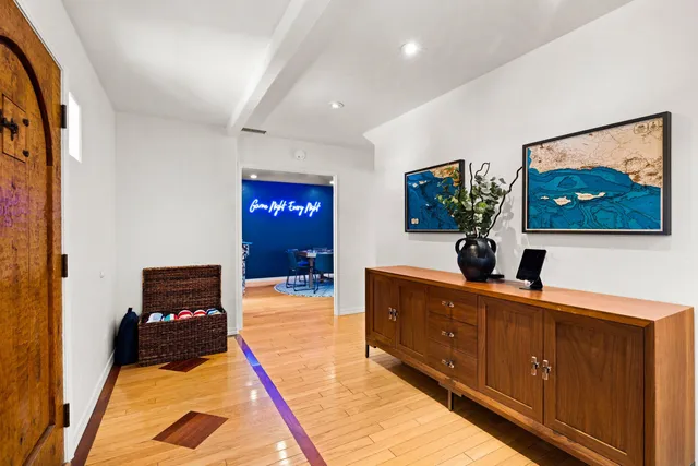 a workspace with furniture and wooden floor