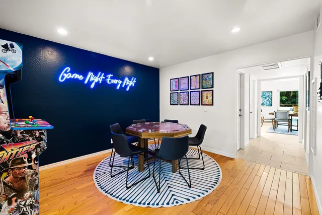 a dining room with furniture and window