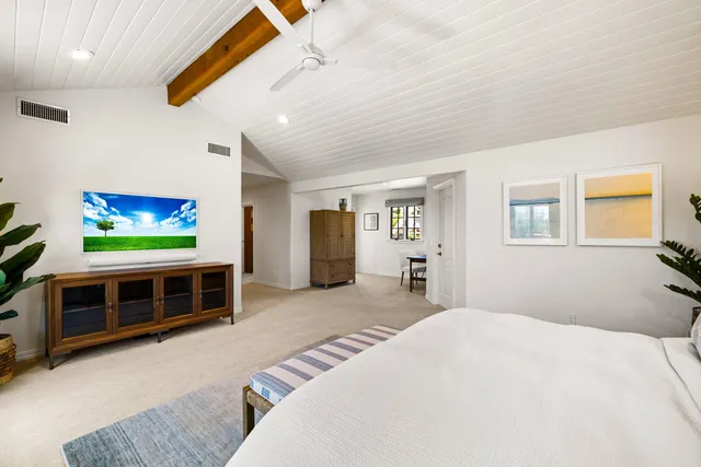 a room with a table and chairs