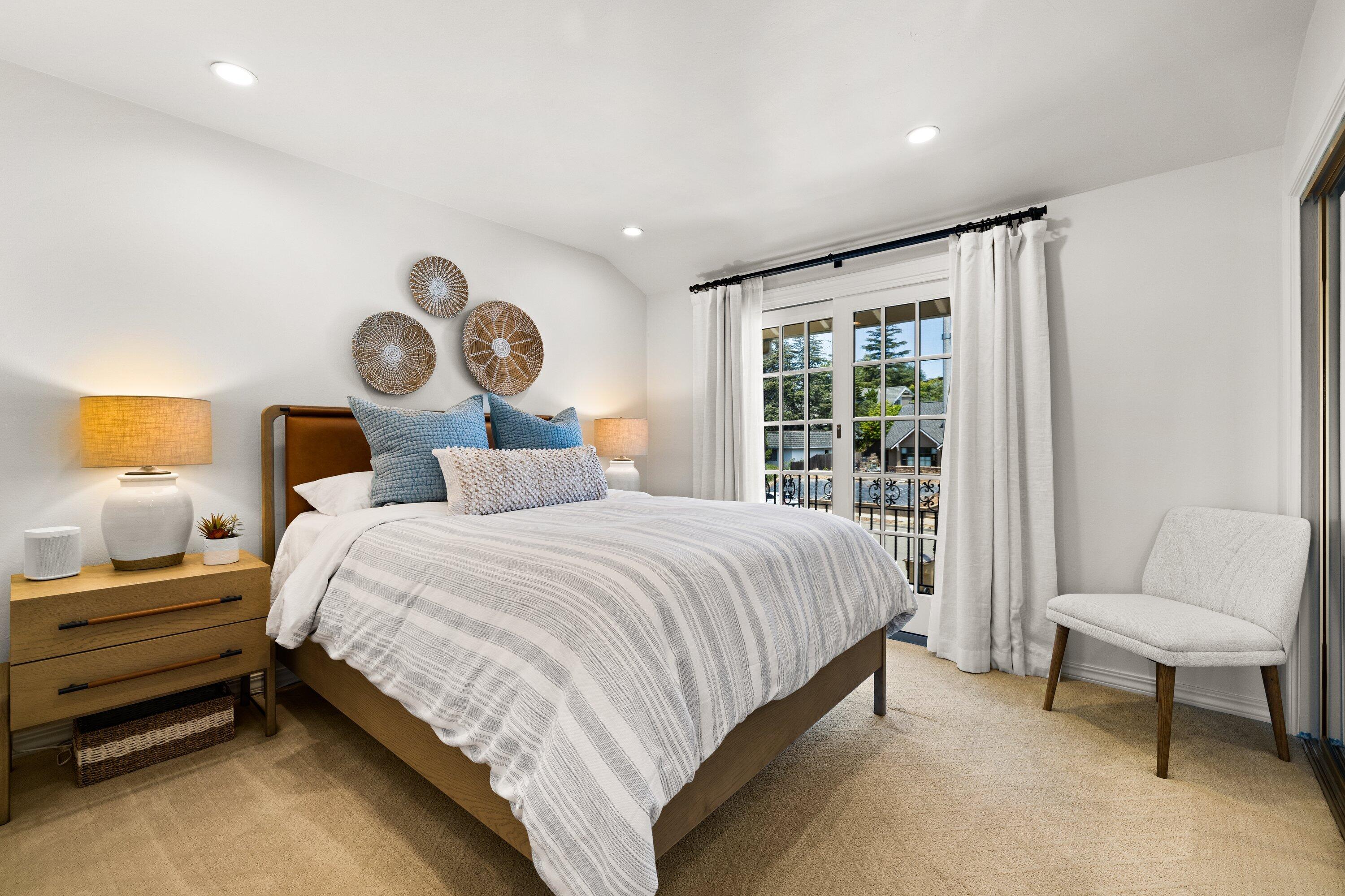 5329 University Drive Santa Barbara, CA 93111 - Photo 29 of 51 a bedroom with a bed and a window