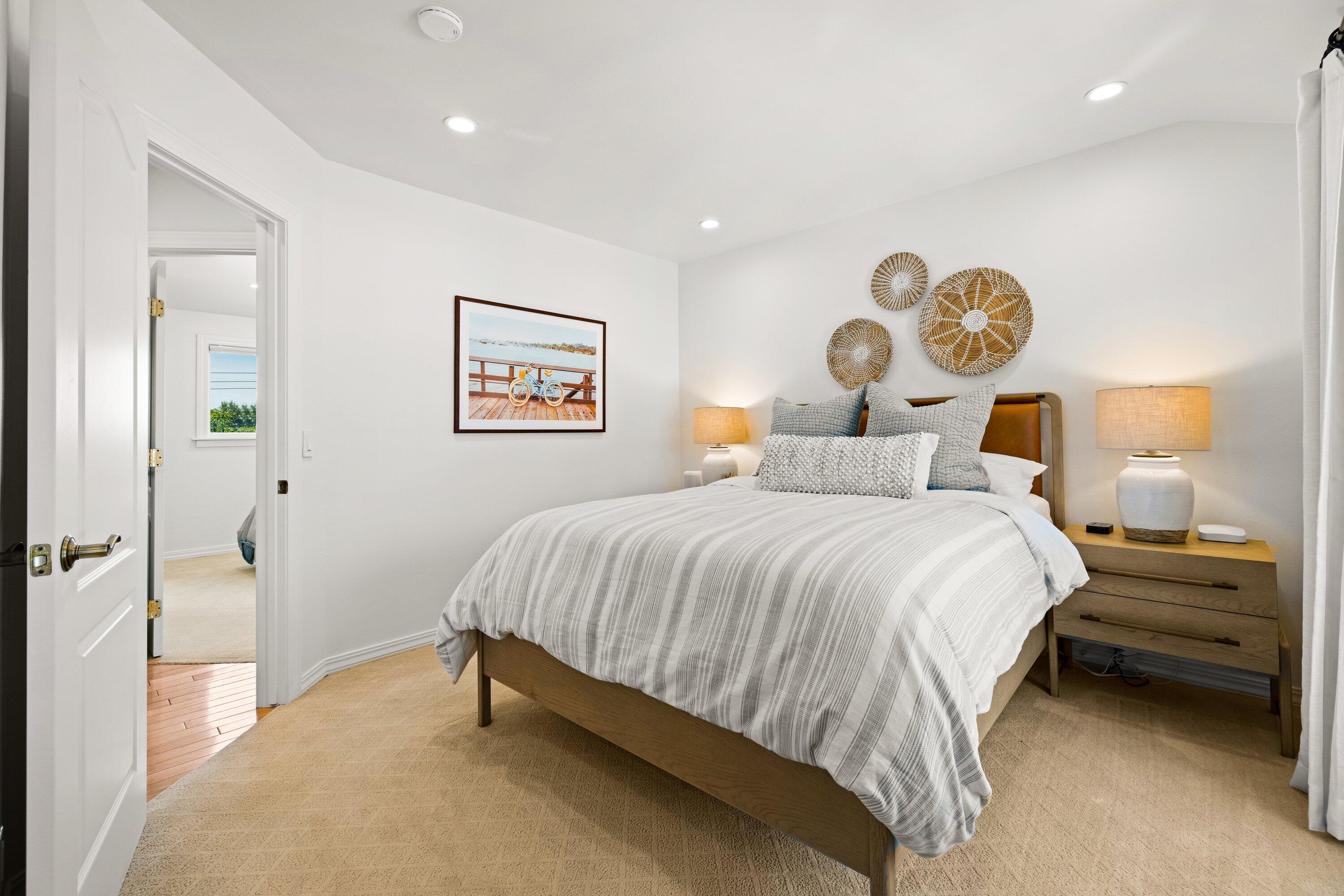 5329 University Drive Santa Barbara, CA 93111 - Photo 30 of 51 a bedroom with a bed and a window