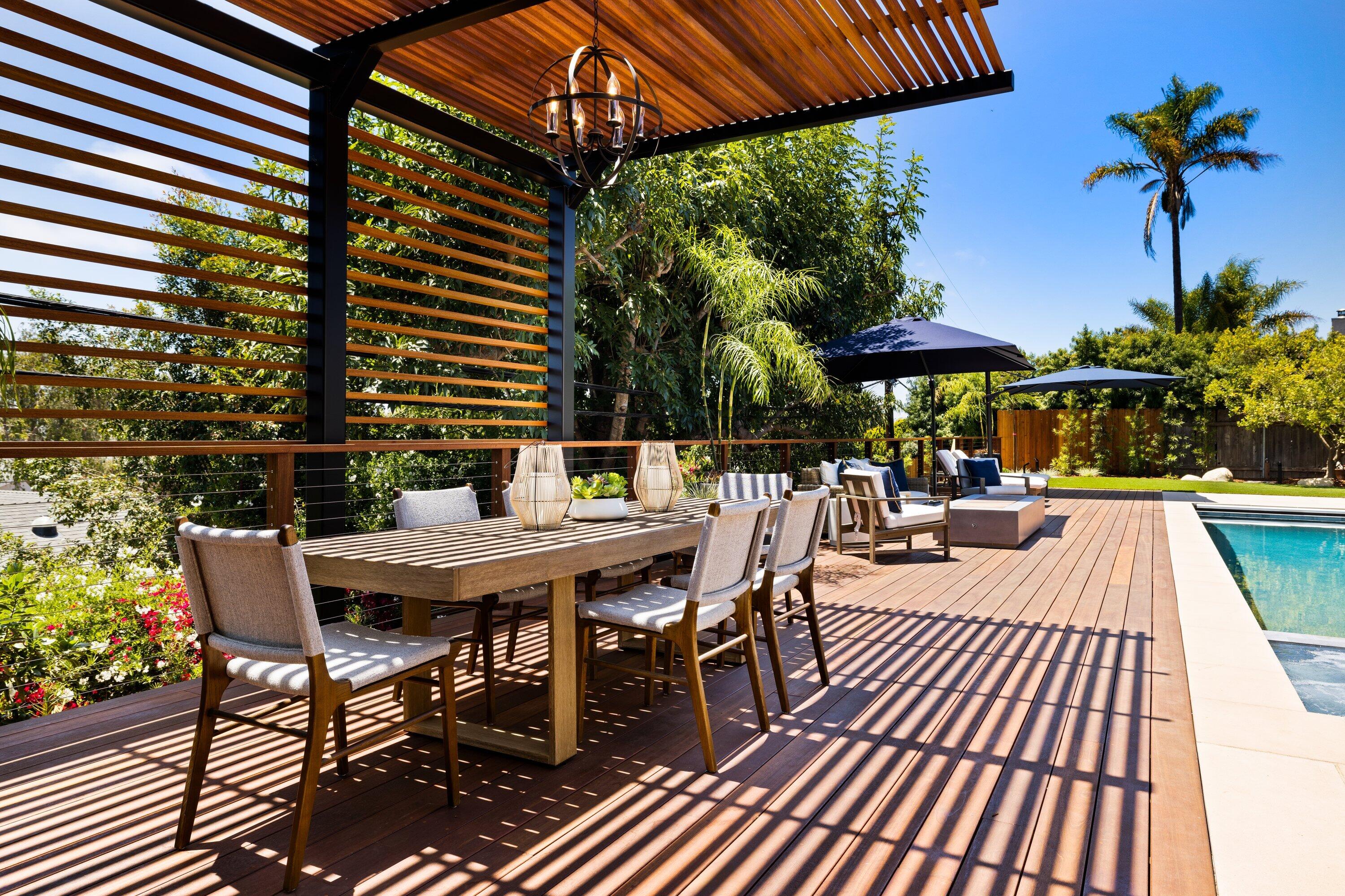 5329 University Drive Santa Barbara, CA 93111 - Photo 42 of 51 a view of a patio with a table and chairs