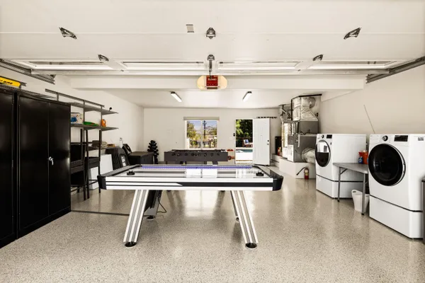 a view of a pathway of a building next to a yard