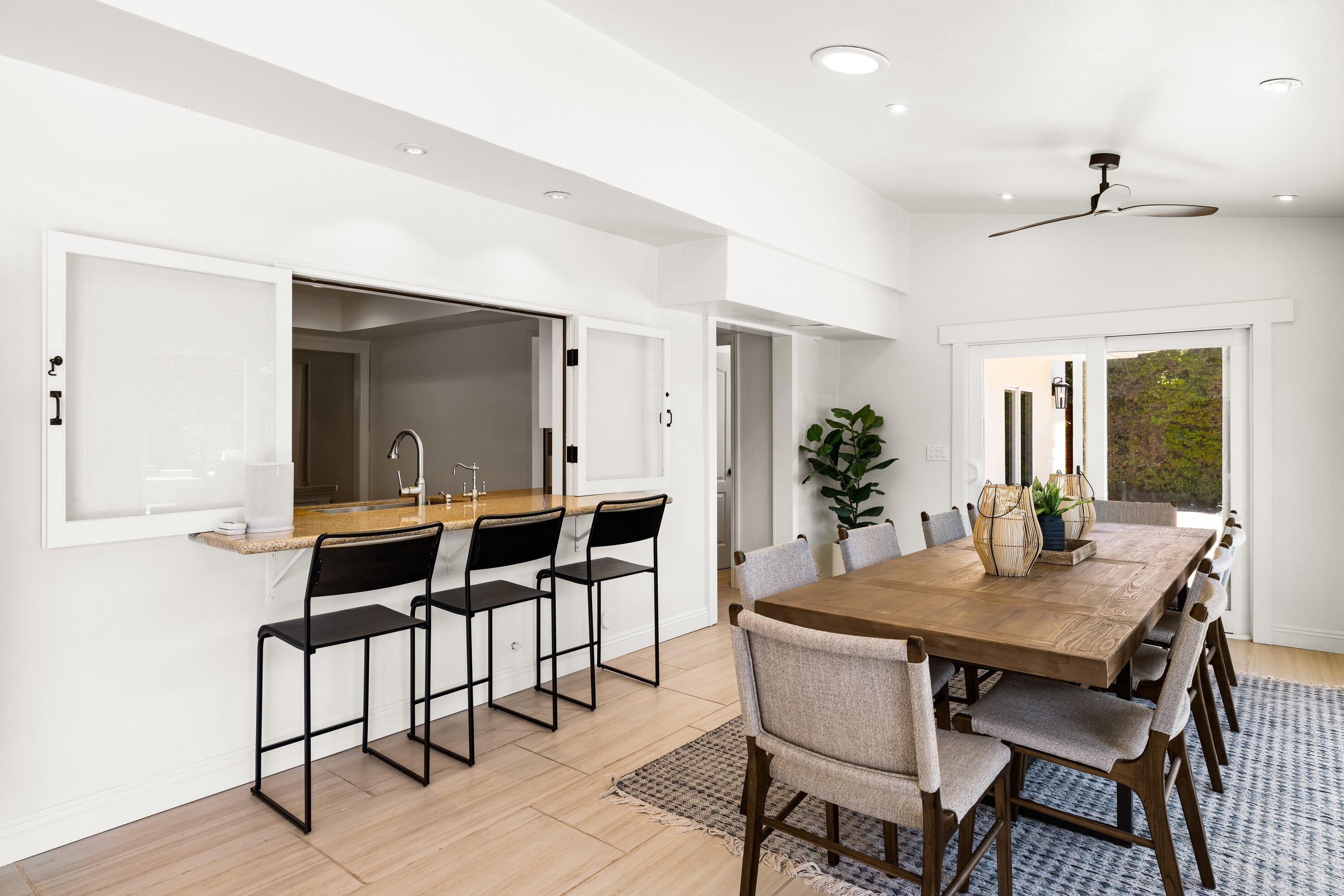 5329 University Drive Santa Barbara, CA 93111 - Photo 7 of 51 a dining room with furniture and wooden floor