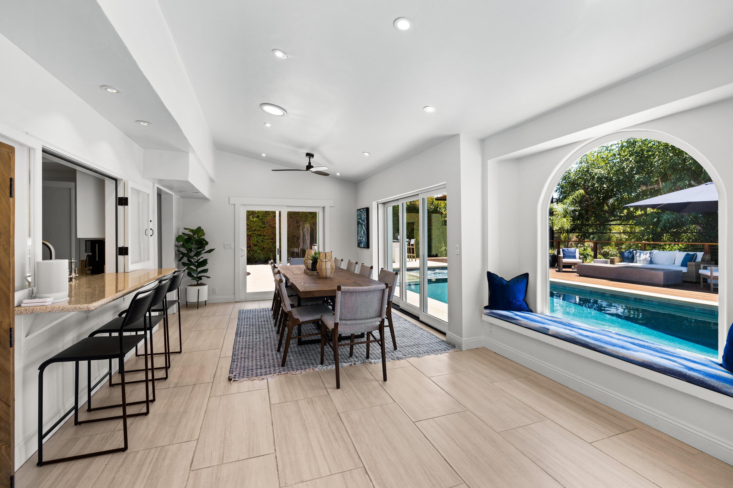 5329 University Drive Santa Barbara, CA 93111 - Photo 9 of 51 a view of a dining room with furniture window and wooden floor