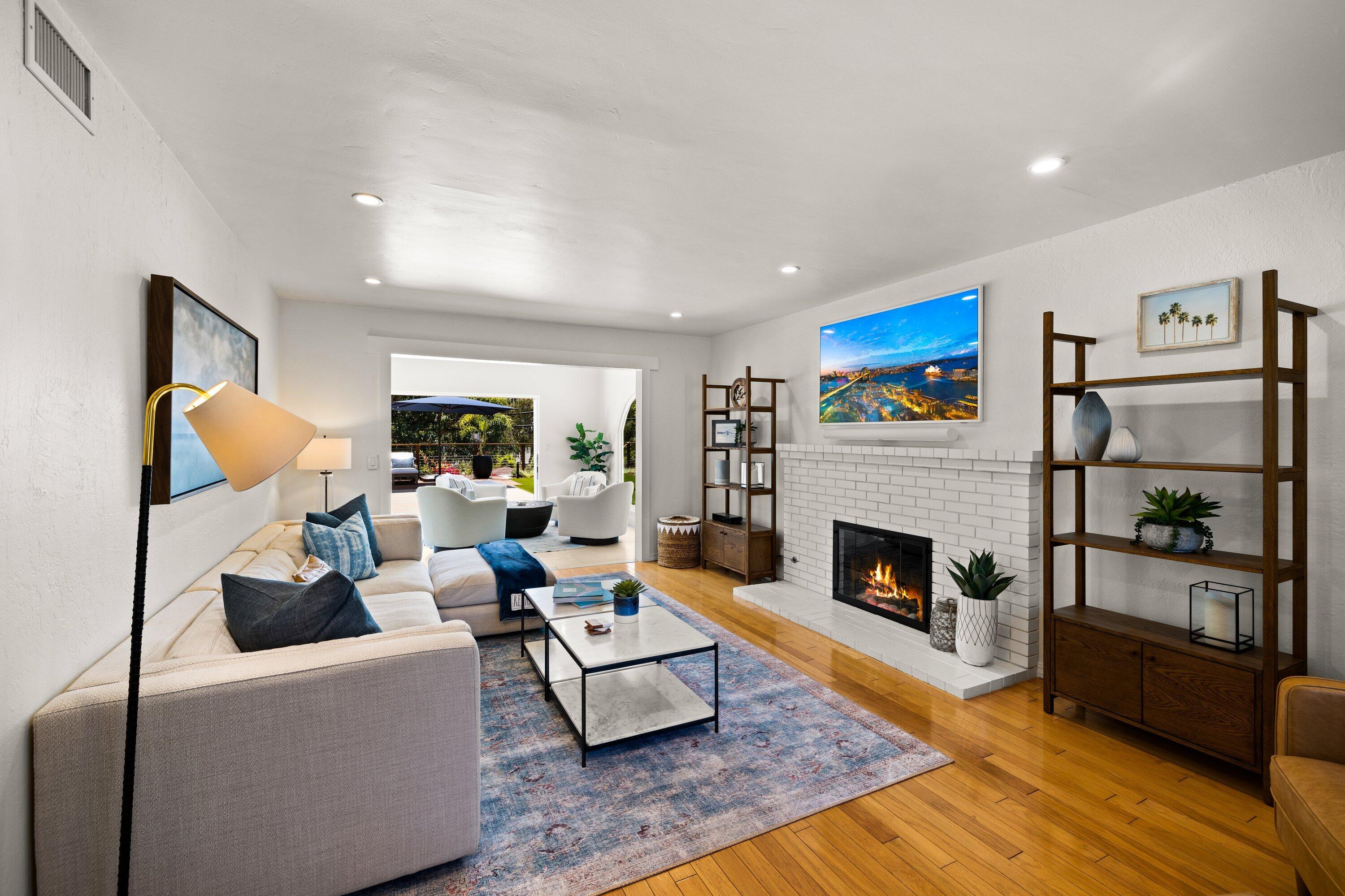 5329 University Drive Santa Barbara, CA 93111 - Photo 10 of 51 a living room with furniture and a fireplace