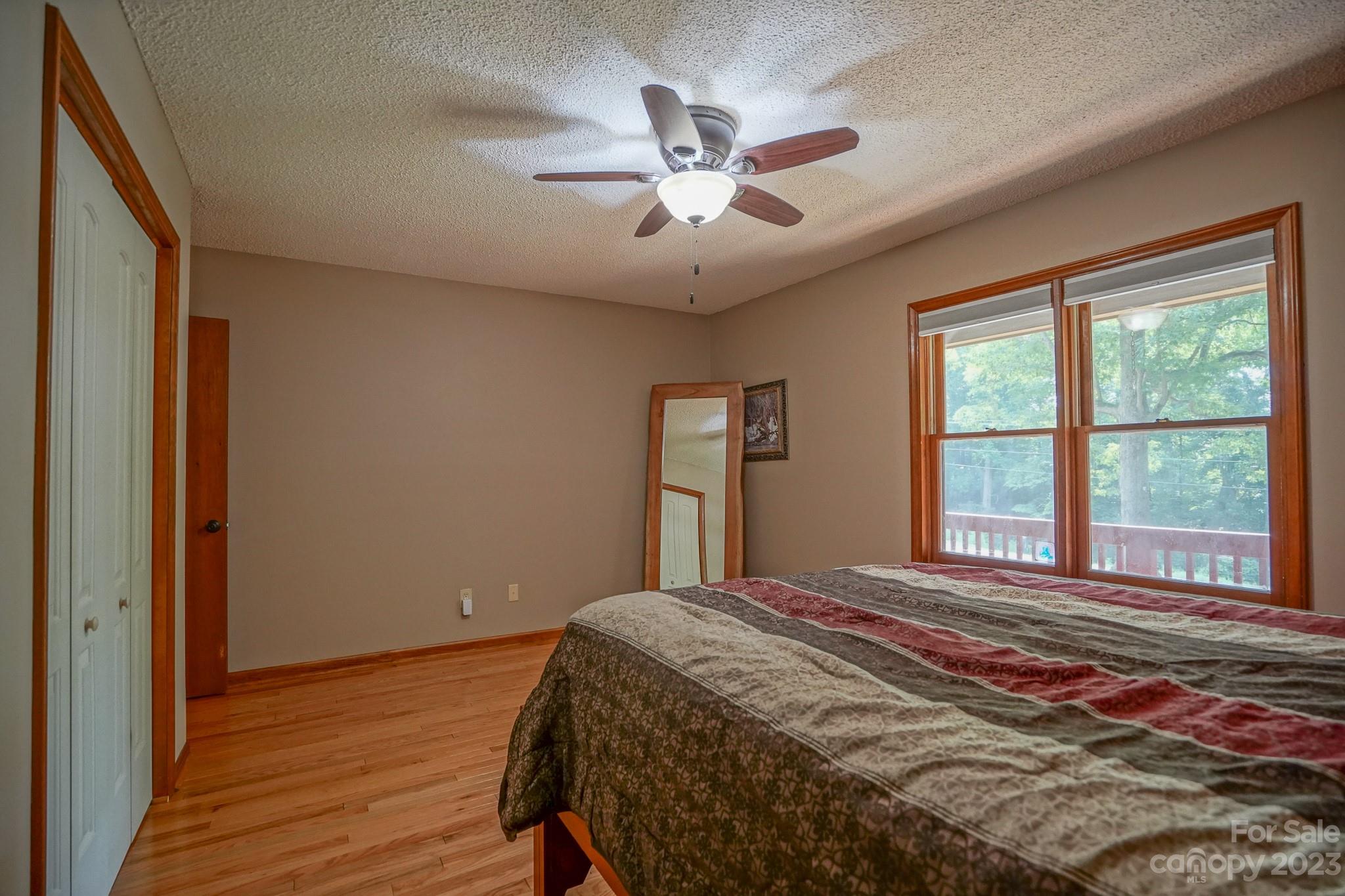 2743 Harmony Highway Harmony, NC 28634 - Photo 15 of 47 a bedroom with a large bed and a window