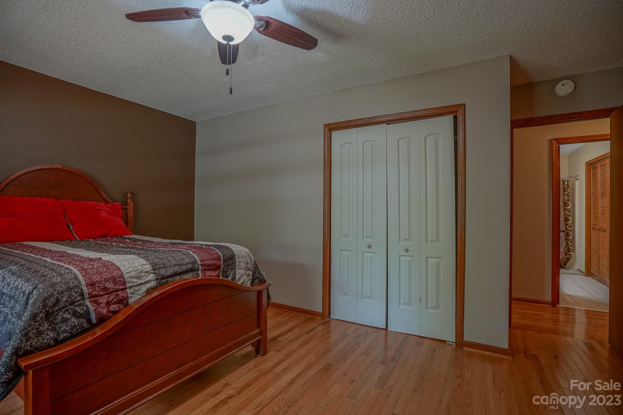 2743 Harmony Highway Harmony, NC 28634 - Photo 17 of 47 a bedroom with a bed and wooden floor