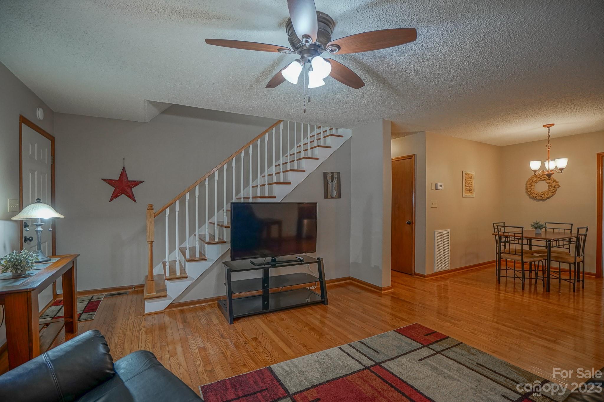 2743 Harmony Highway Harmony, NC 28634 - Photo 26 of 47 a living room with furniture and a wooden floor