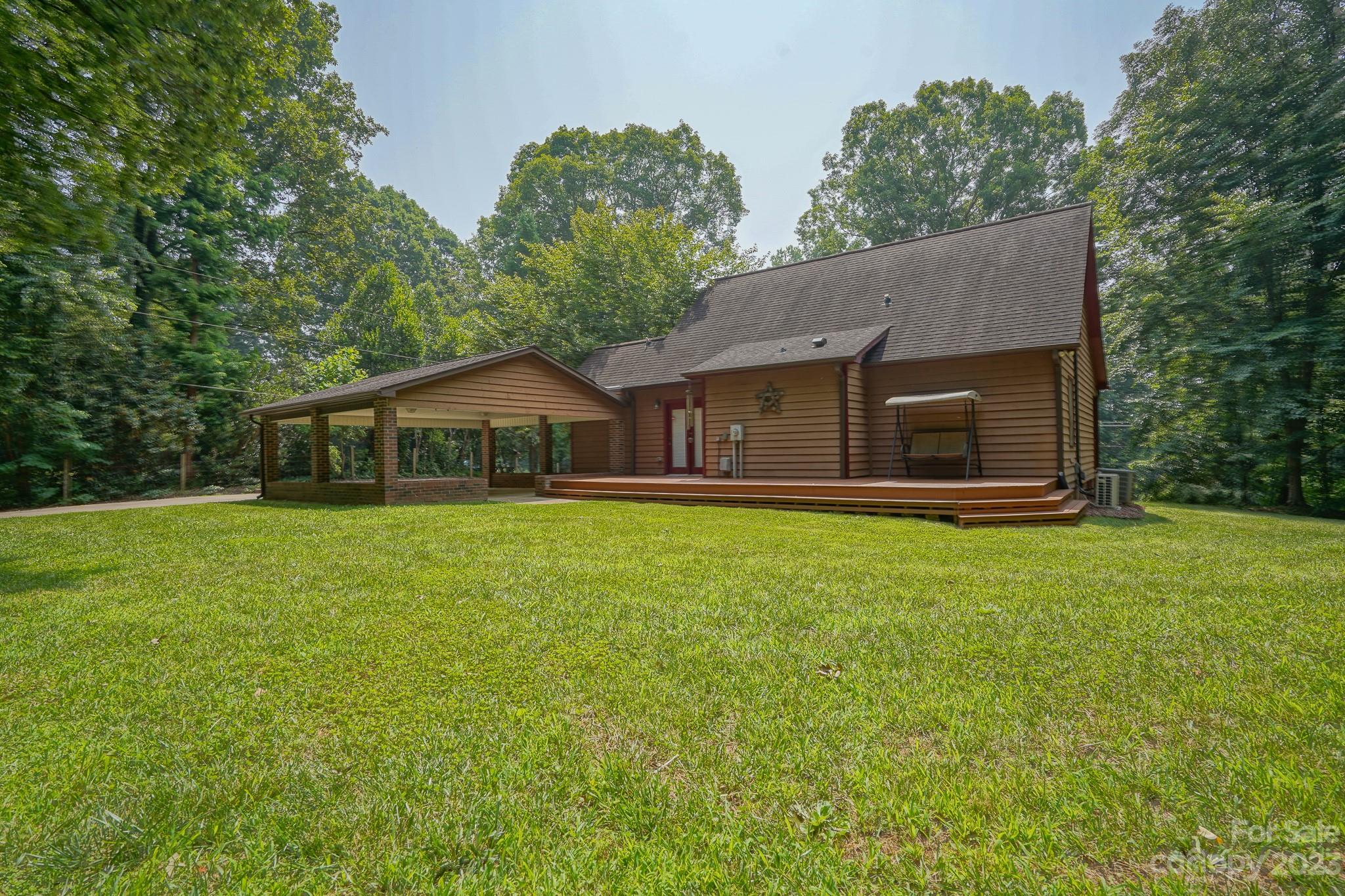 2743 Harmony Highway Harmony, NC 28634 - Photo 37 of 47 a front view of house with yard and green space