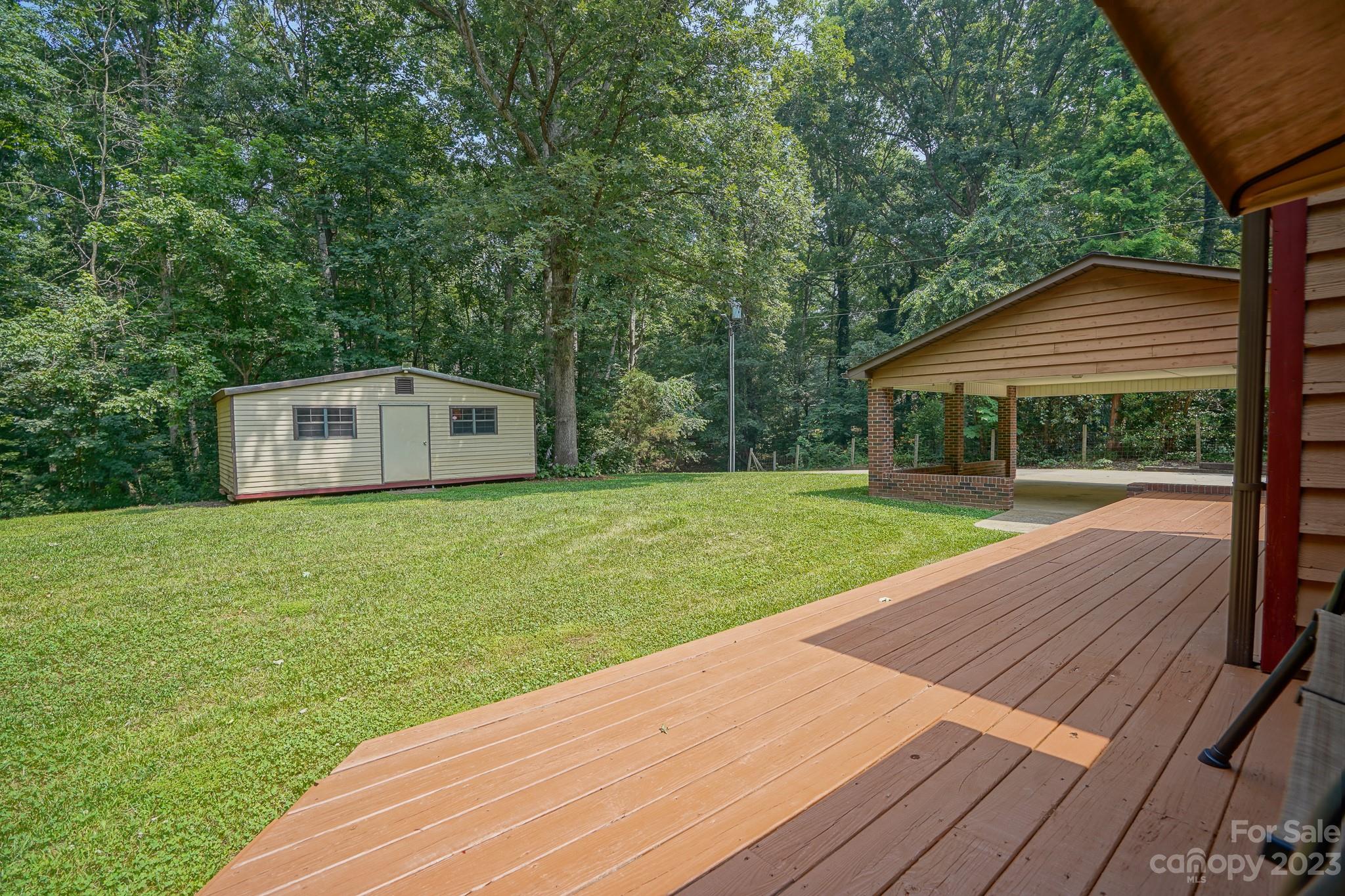 2743 Harmony Highway Harmony, NC 28634 - Photo 38 of 47 a view of house with backyard space