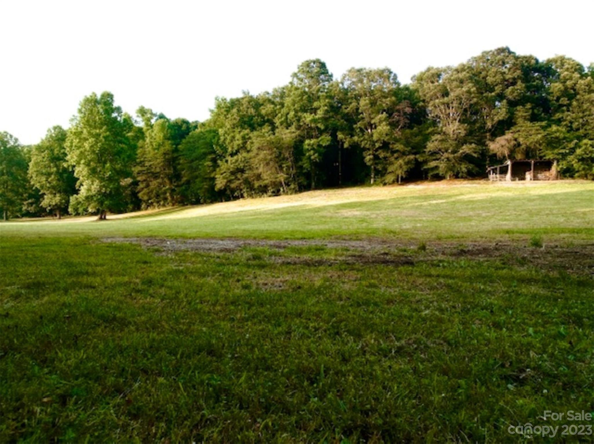 2743 Harmony Highway Harmony, NC 28634 - Photo 46 of 47 a view of outdoor space with green field