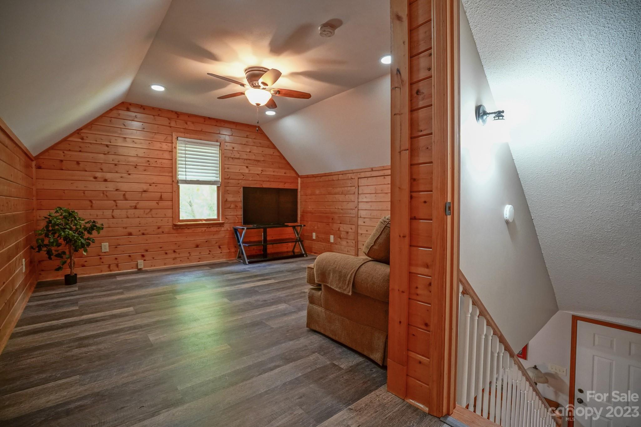 2743 Harmony Highway Harmony, NC 28634 - Photo 9 of 47 a view of a livingroom with furniture staircase and a ceiling fan