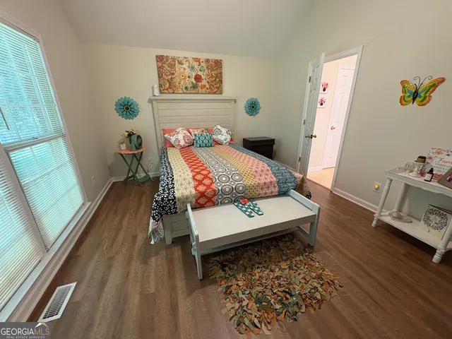 a living room with a couch and a table