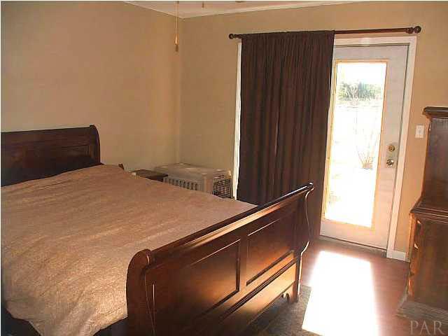 9493 Hay Meadow Road Milton, FL 32583 - Photo 12 of 24 Master Bedroom